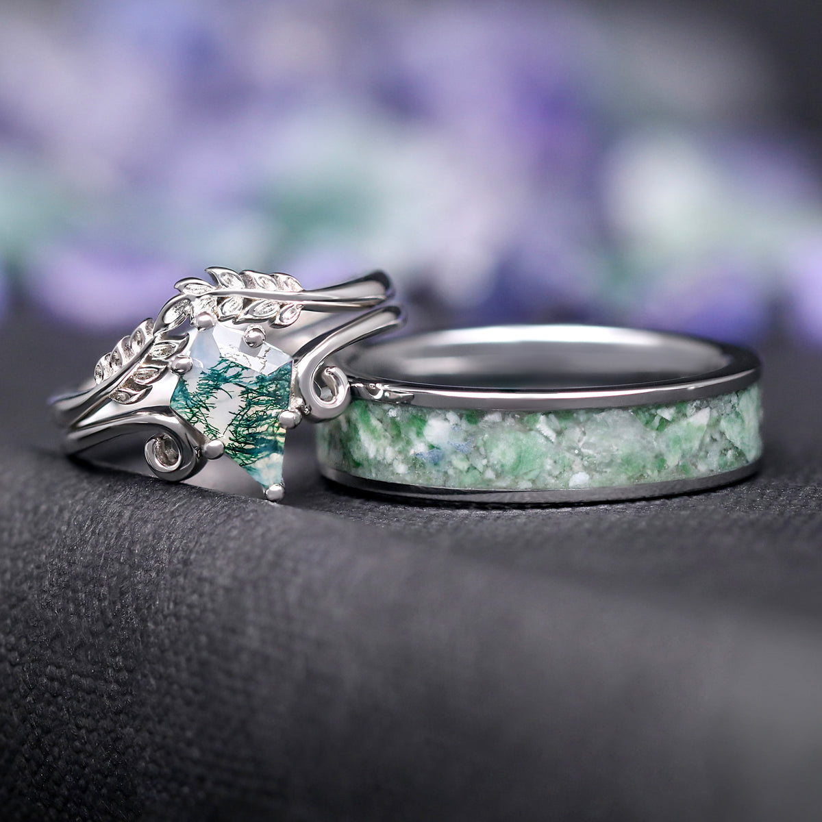 His and hers wedding ring set in silver with moss agate, engagement ring leaning on the band
