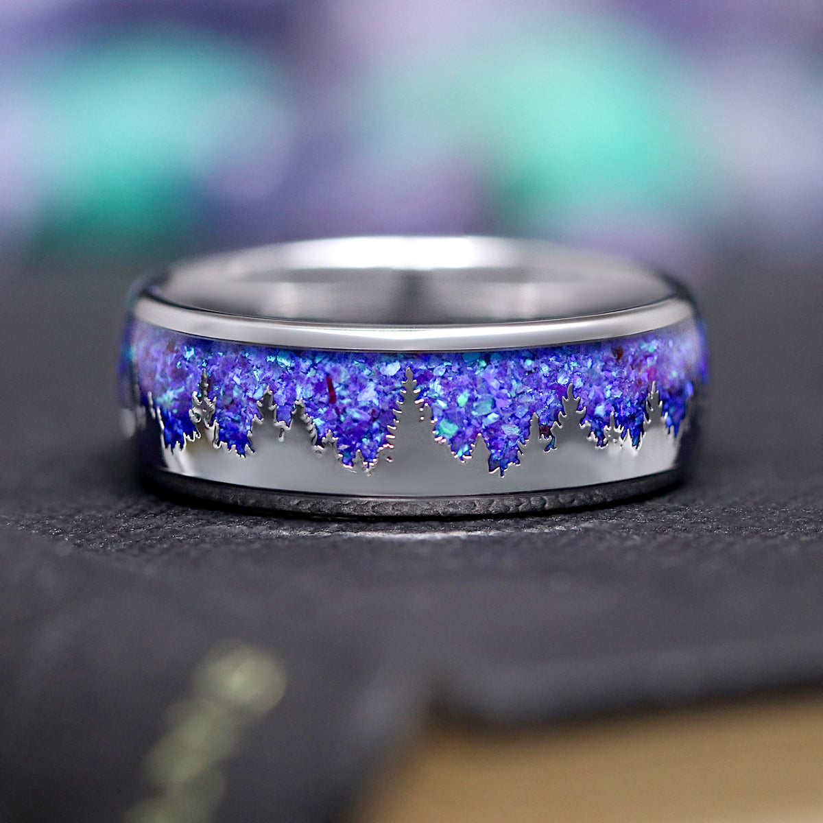 Men's 8mm silver tungsten band with aurora opal inlay and a tree silhouette, front view