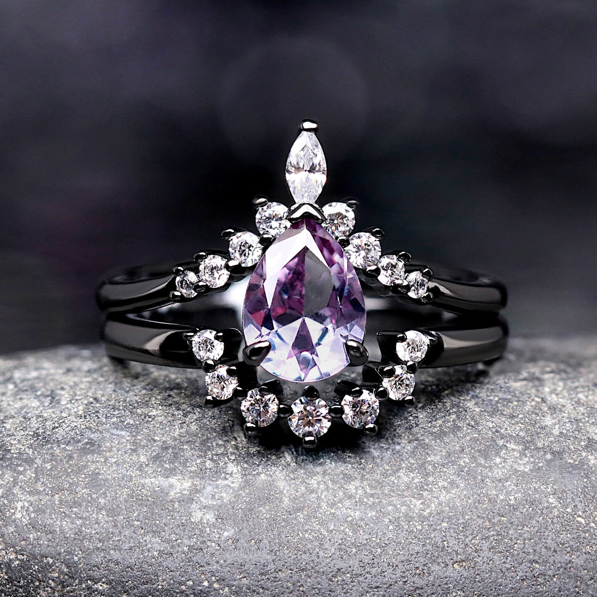 His and her matching purple Crab Nebula rings