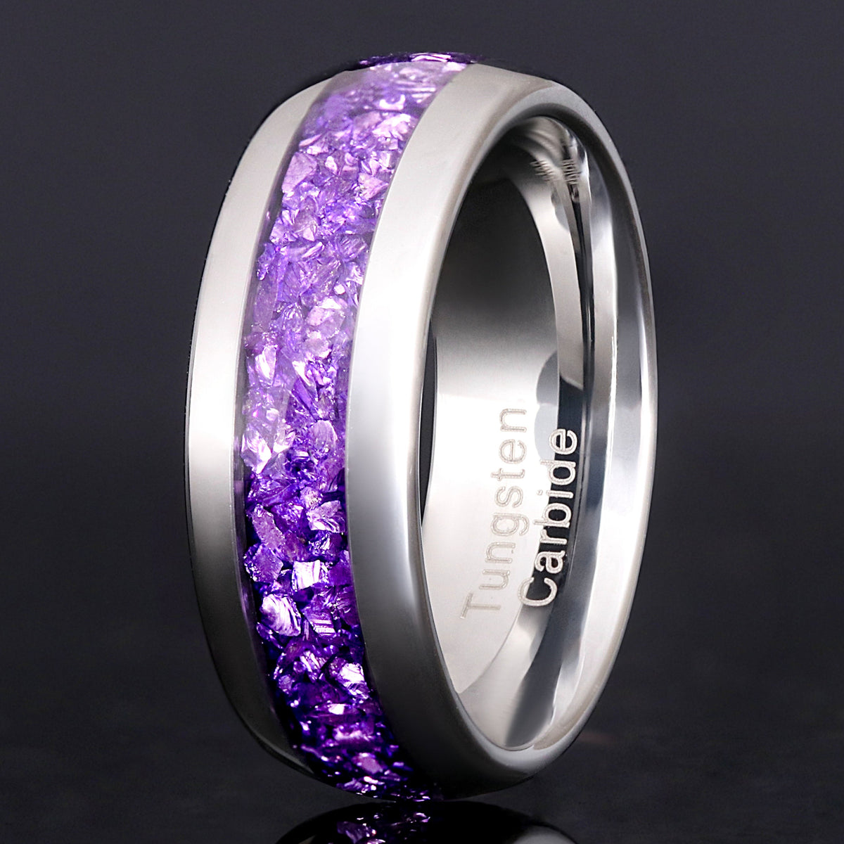 Men's 8mm silver tungsten wedding band with crushed amethyst inlay, standing upright