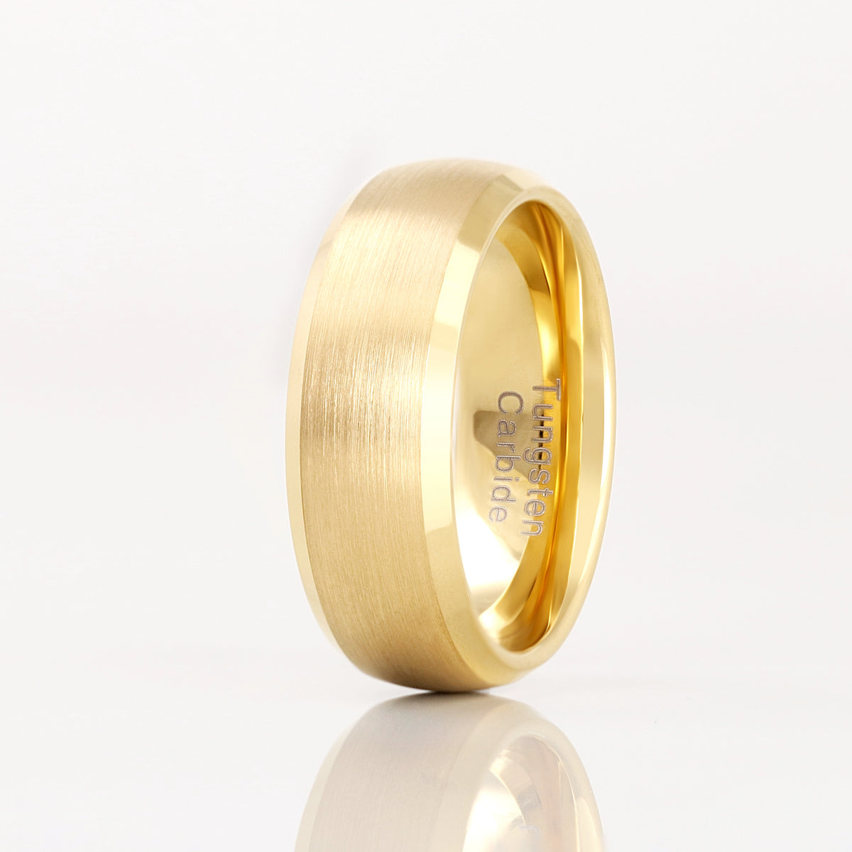 Men's 8mm brushed gold tungsten band standing angled to show the polished gold interior