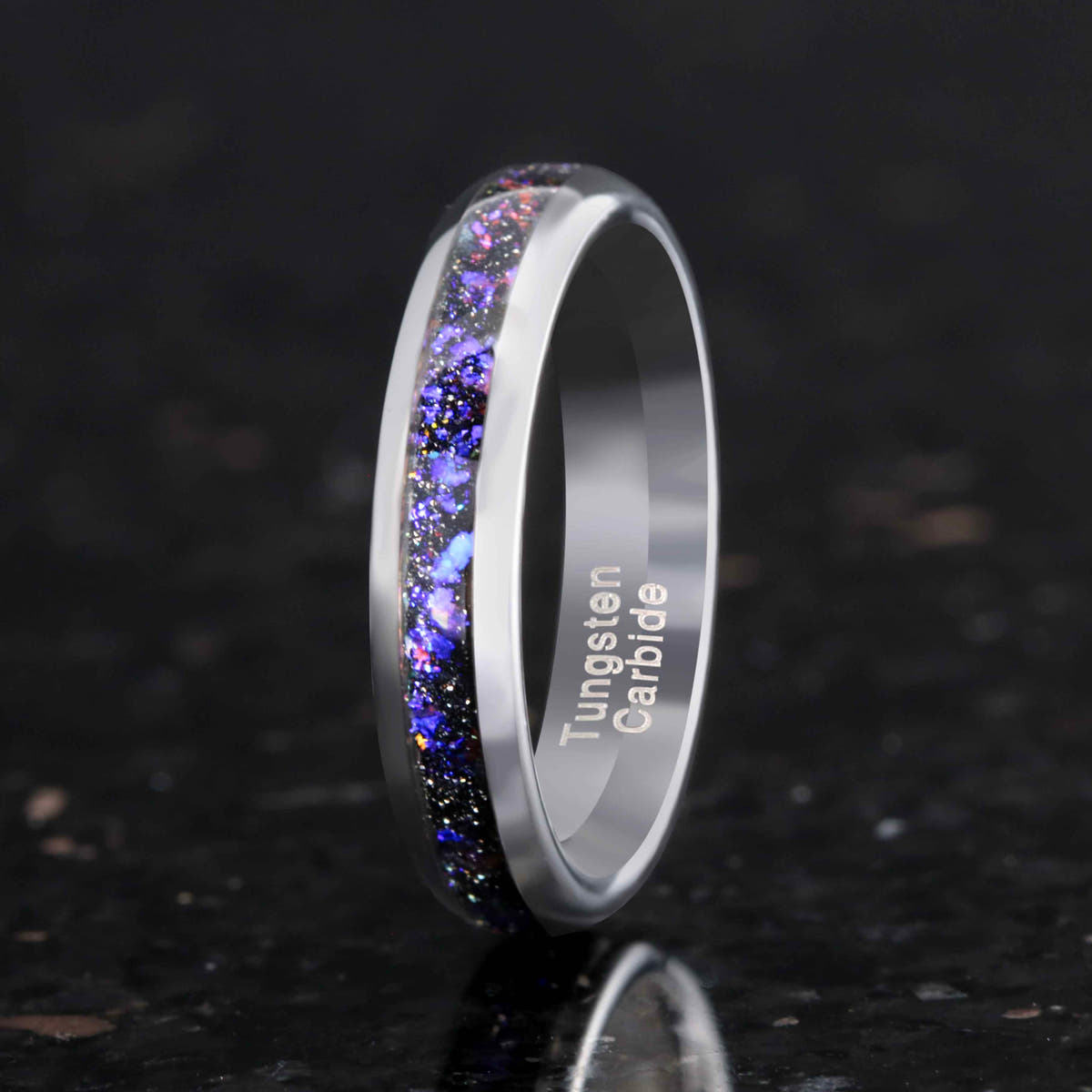 4mm silver tungsten band with nebula sandstone inlay standing on edge, interior visible