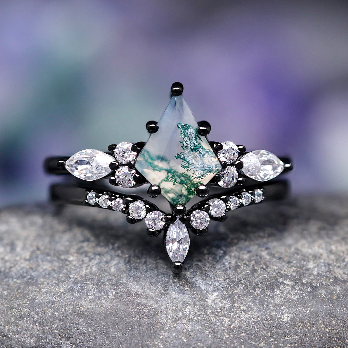 Women's black sterling silver kite moss agate engagement ring with marquise side stones, straight on