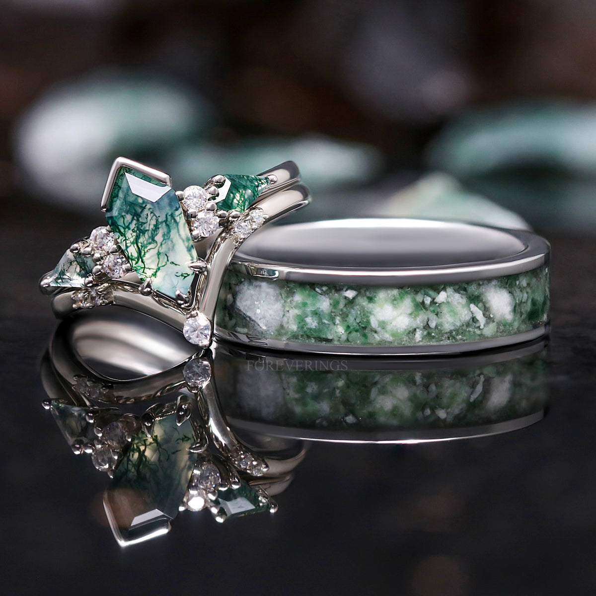 6mm silver tungsten moss agate band beside a kite-cut moss agate bridal set in sterling silver