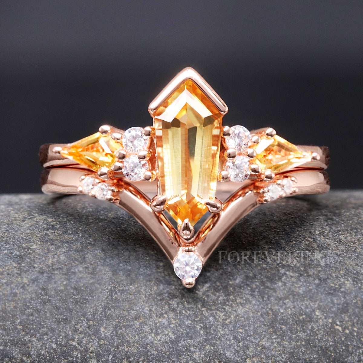 Women's rose gold sterling silver kite-cut citrine ring with a V-shaped band, front view