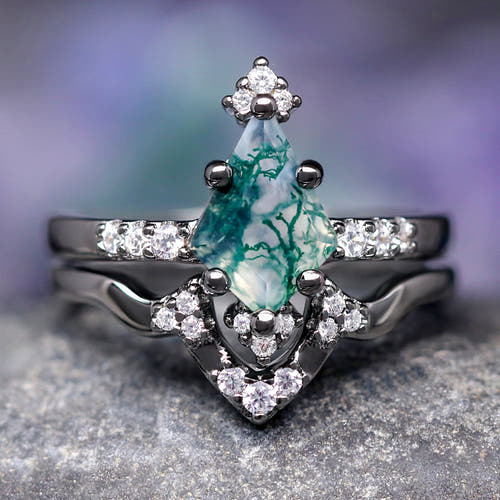 Women's kite-cut moss agate engagement ring set in black sterling silver, shown straight on