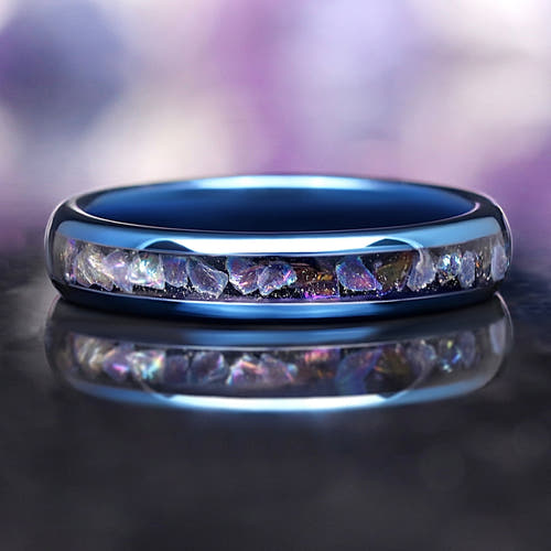 Moonstone tungsten wedding band with blue finish and glowing inlay, inspired by the Veil Nebula
