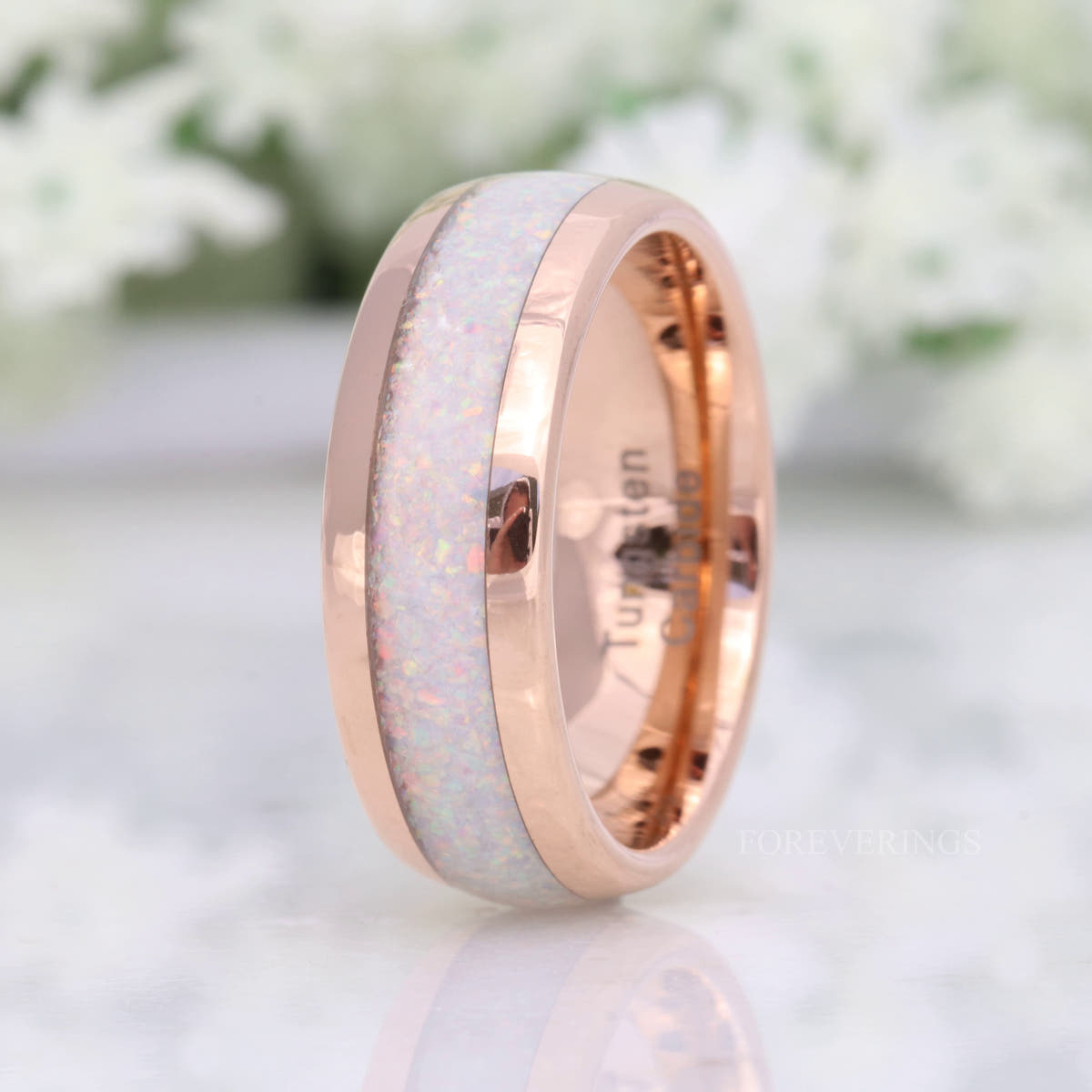8mm rose gold tungsten white fire opal band, standing at a slight angle