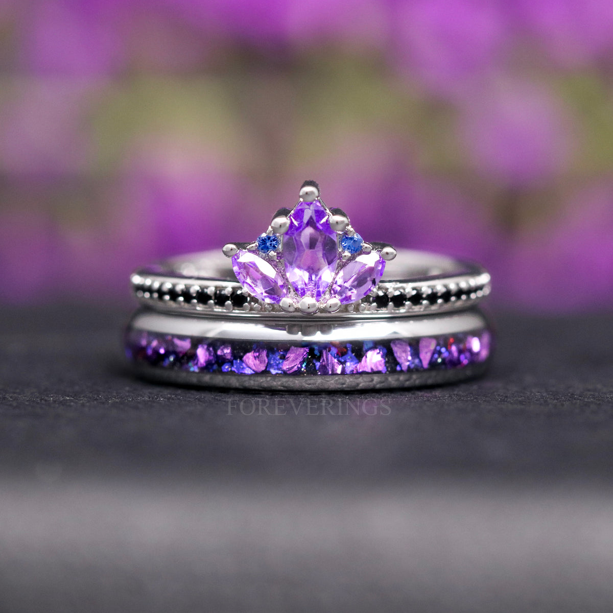 Amethyst engagement ring stacked on the silver tungsten band, shown straight on