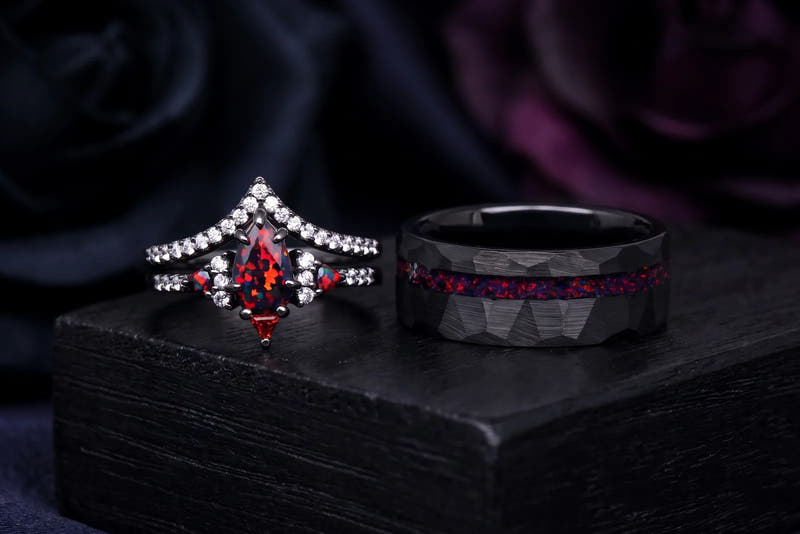 His and hers black wedding ring set: black fire opal engagement ring and hammered black tungsten band with opal inlay