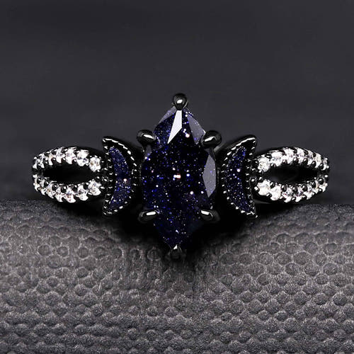 Black sterling silver marquise blue sandstone ring with crescent moon accents, straight on