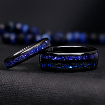 Matching black tungsten couples ring set with crushed blue sapphire inlays, 8mm and 4mm