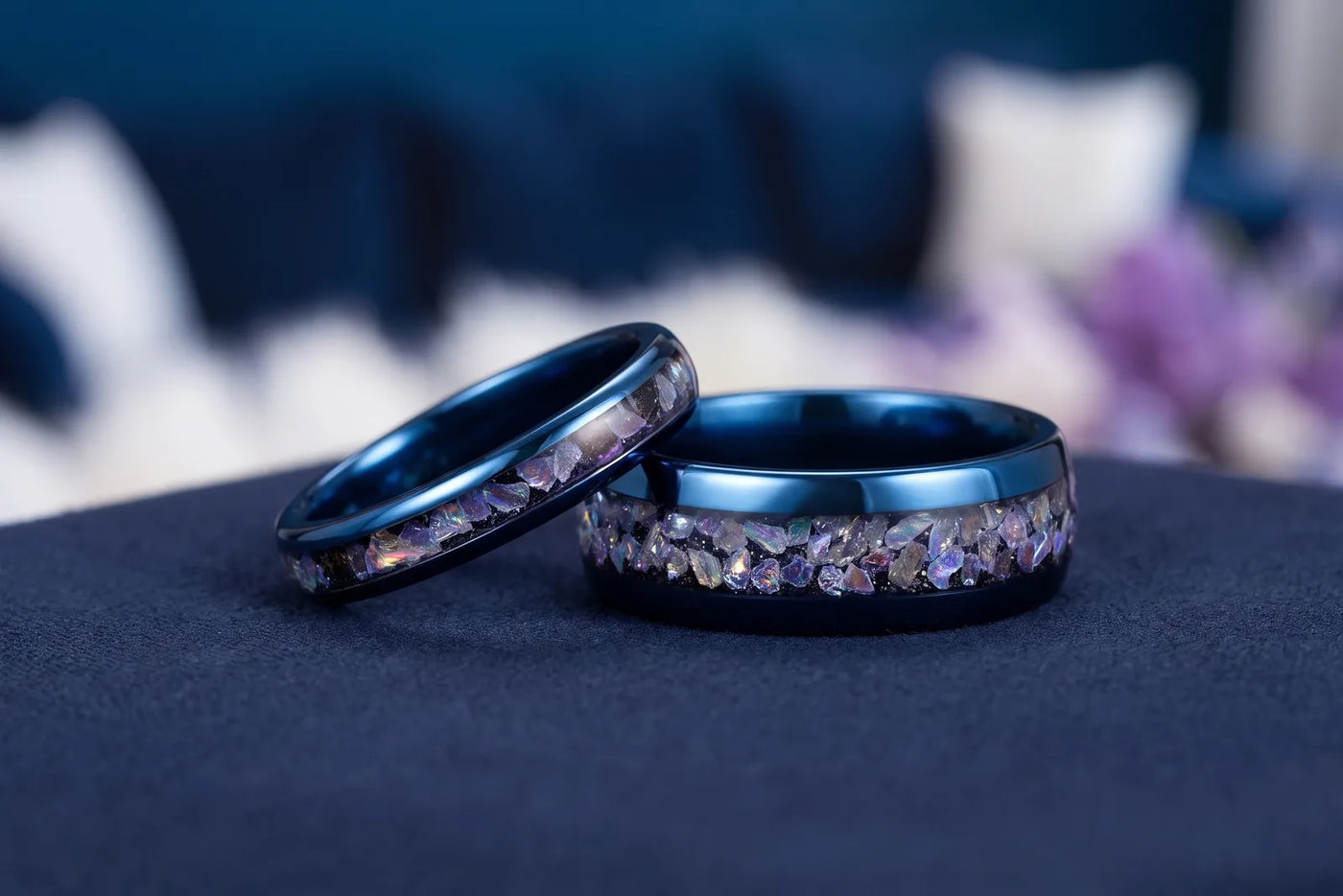 Blue tungsten wedding bands with crushed opal inlay, his and hers