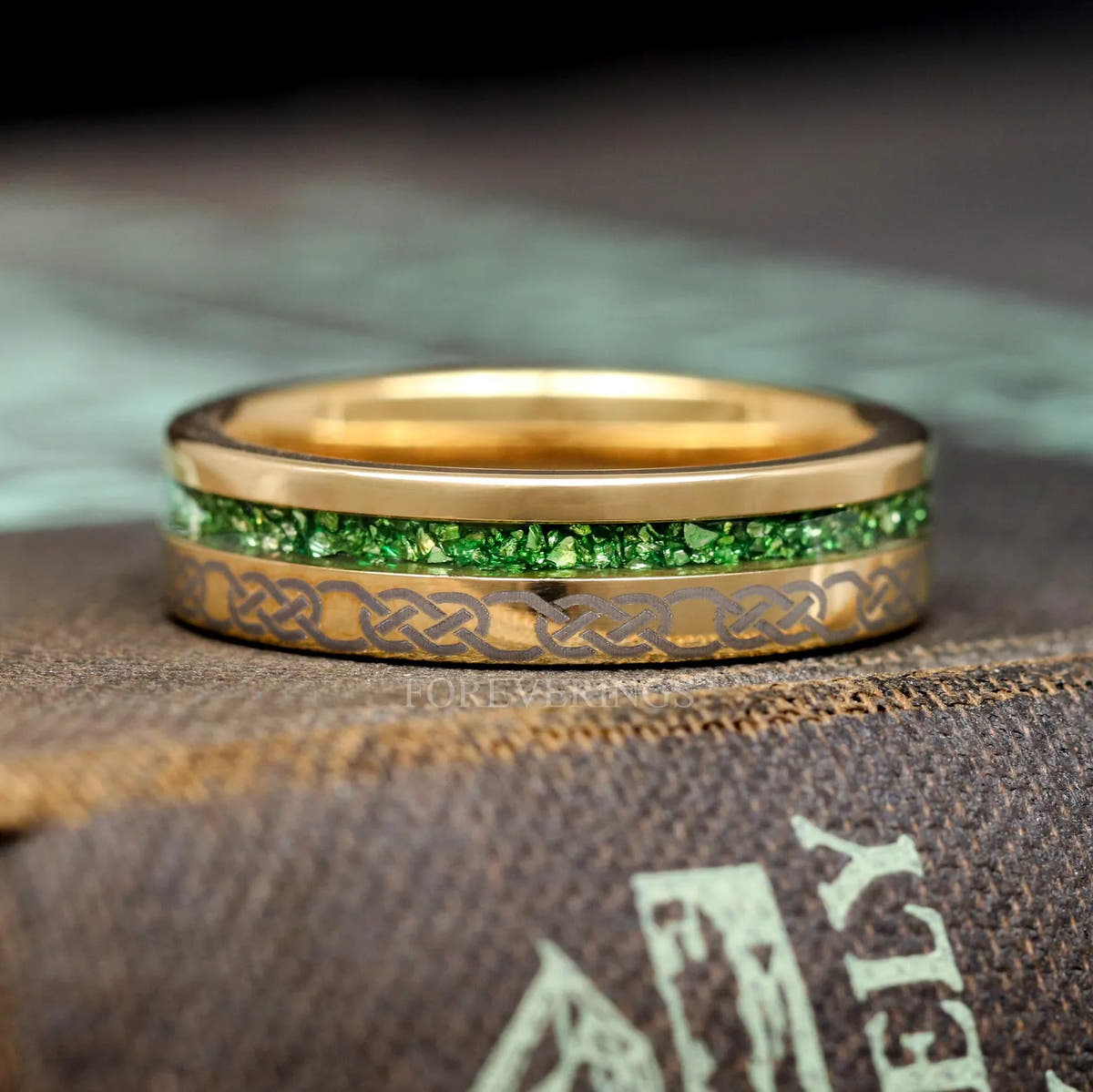 6mm gold tungsten band with crushed emerald inlay shown straight on