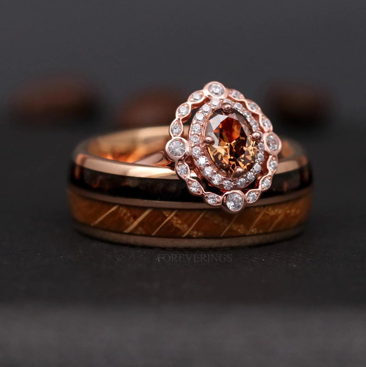 Whiskey barrel and coffee wedding band paired with a rose gold halo engagement ring