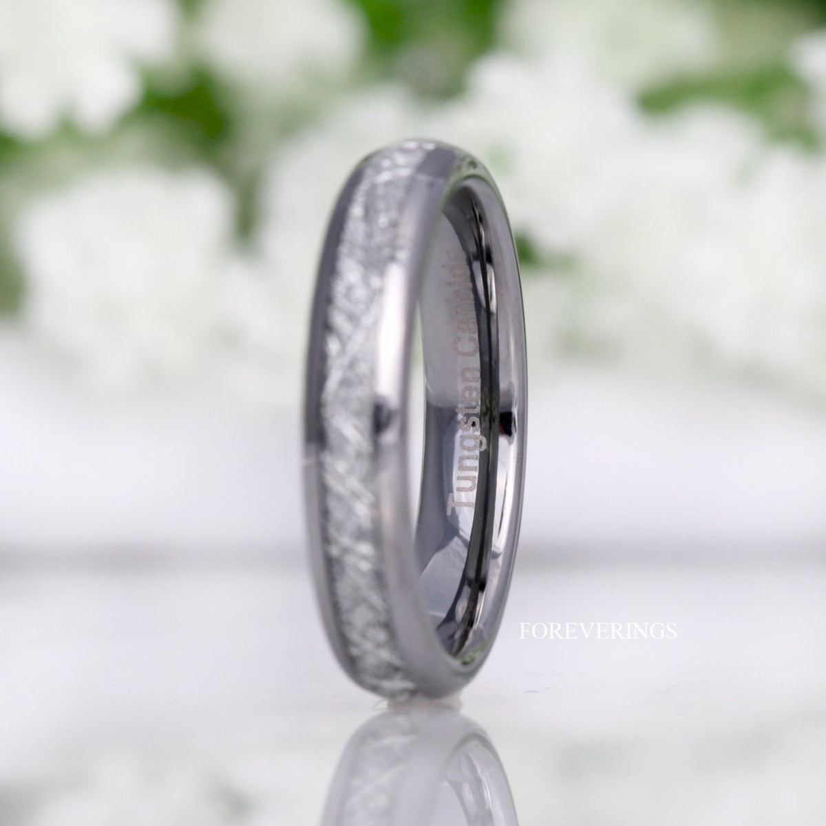 4mm silver tungsten meteorite-look band standing nearly edge-on