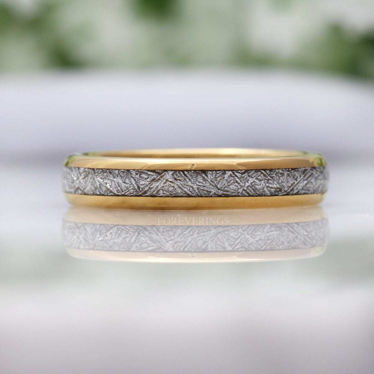 Gold tungsten meteorite-look band shown straight on across the inlay