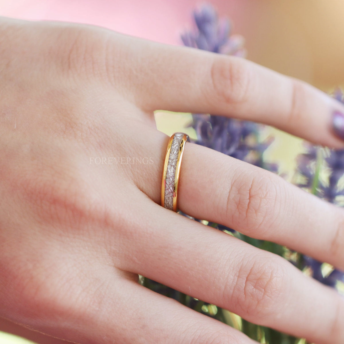 4mm gold tungsten meteorite-look band worn on a hand