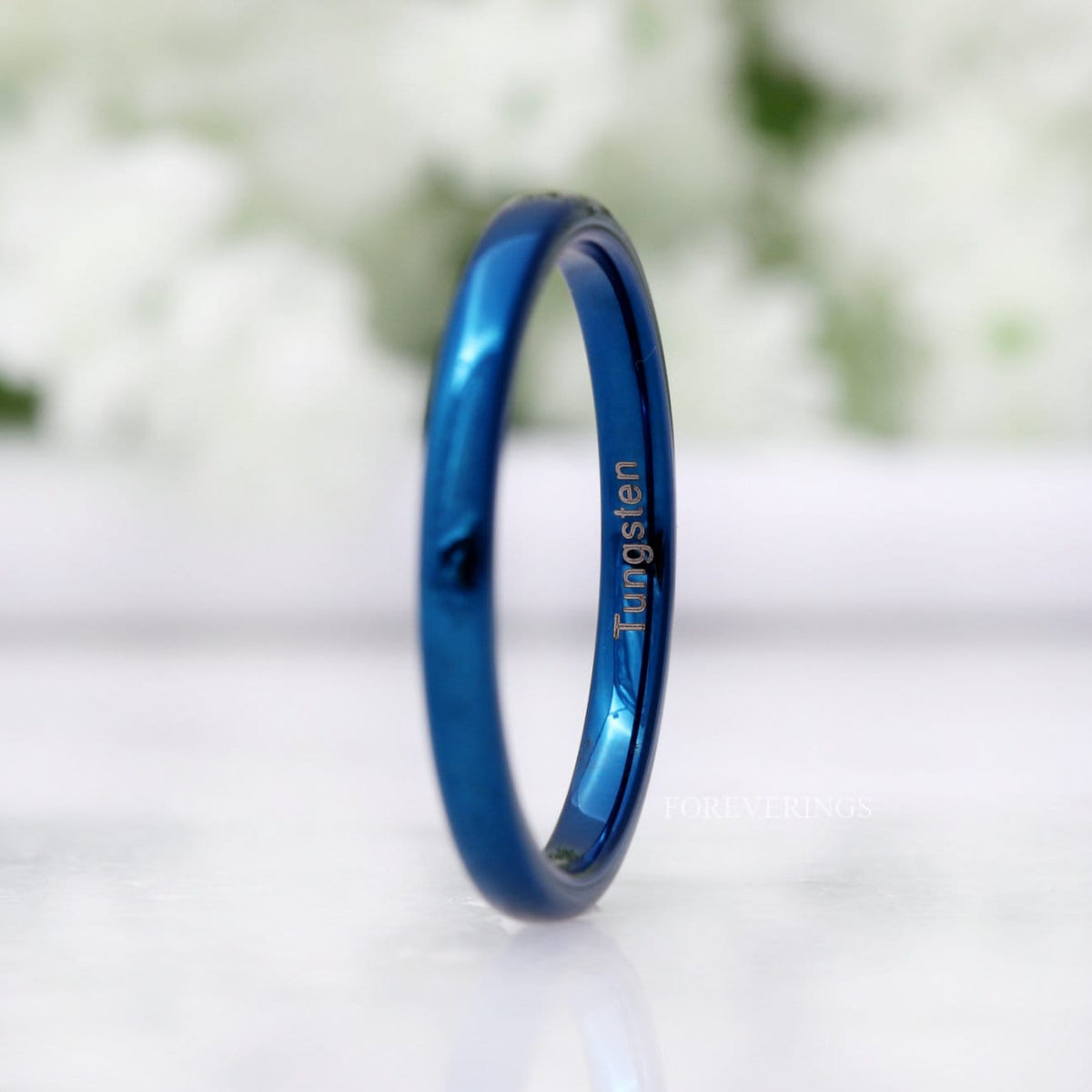 2mm blue tungsten band turned to show the interior