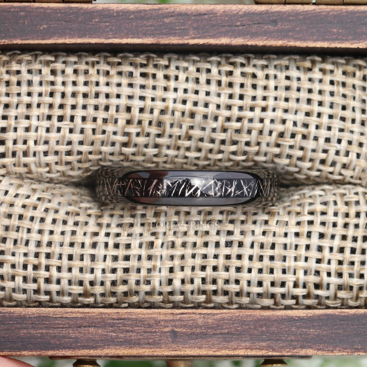4mm black tungsten meteorite-look band in a rustic wood ring box with burlap insert