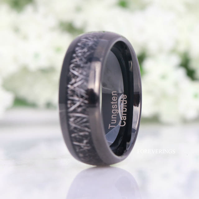 8mm black tungsten band with meteorite-look inlay, angled to show the interior