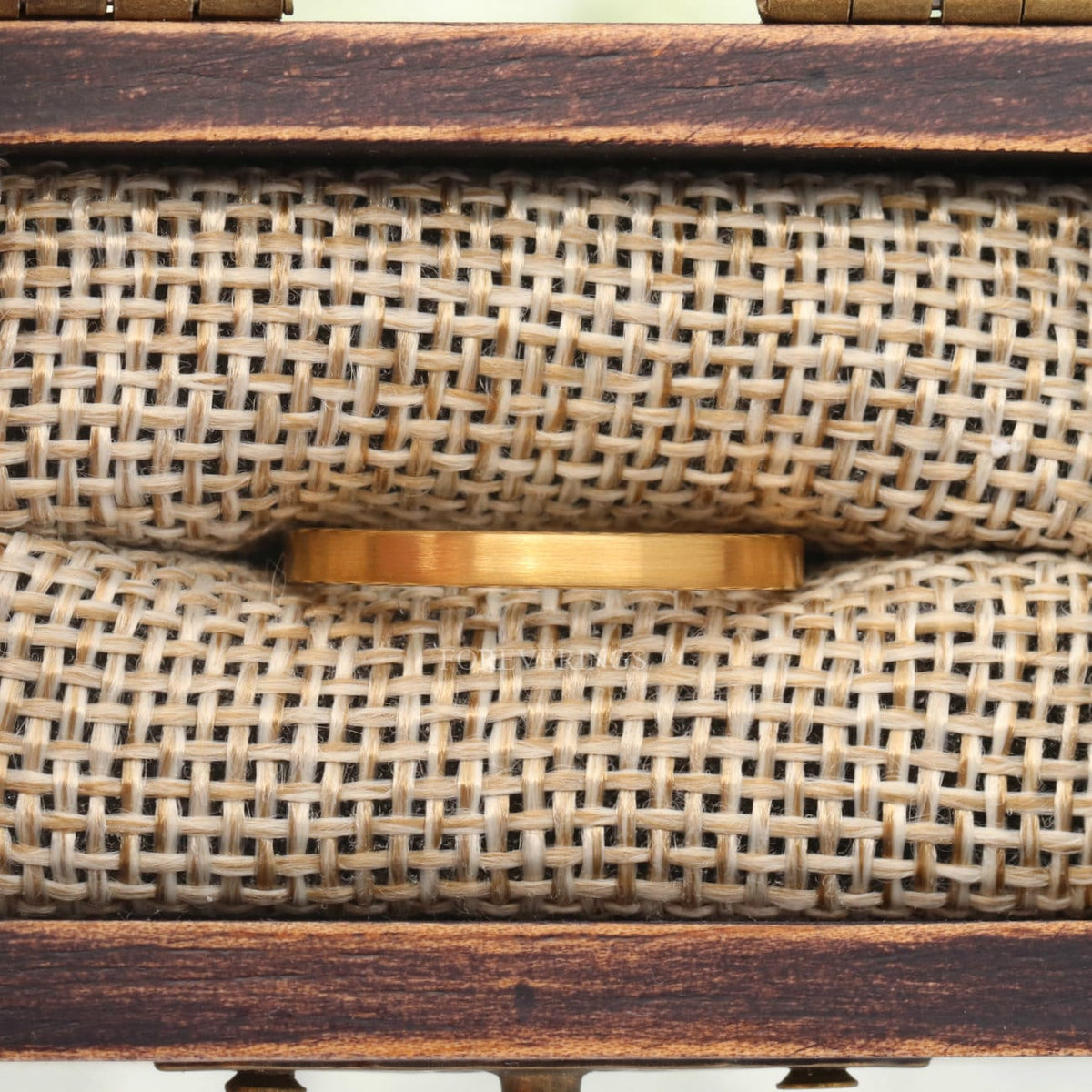 2mm matte gold tungsten band in a wood ring box with burlap insert
