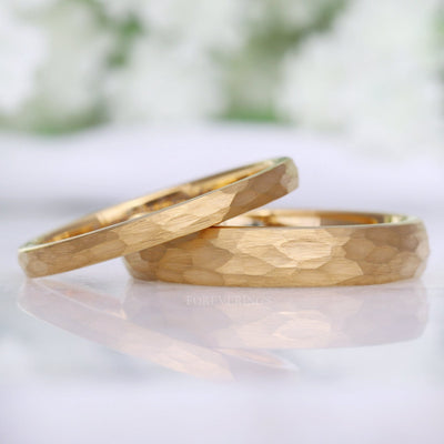 Men's and women's hammered gold tungsten wedding bands in 2mm and 4mm with a matte finish