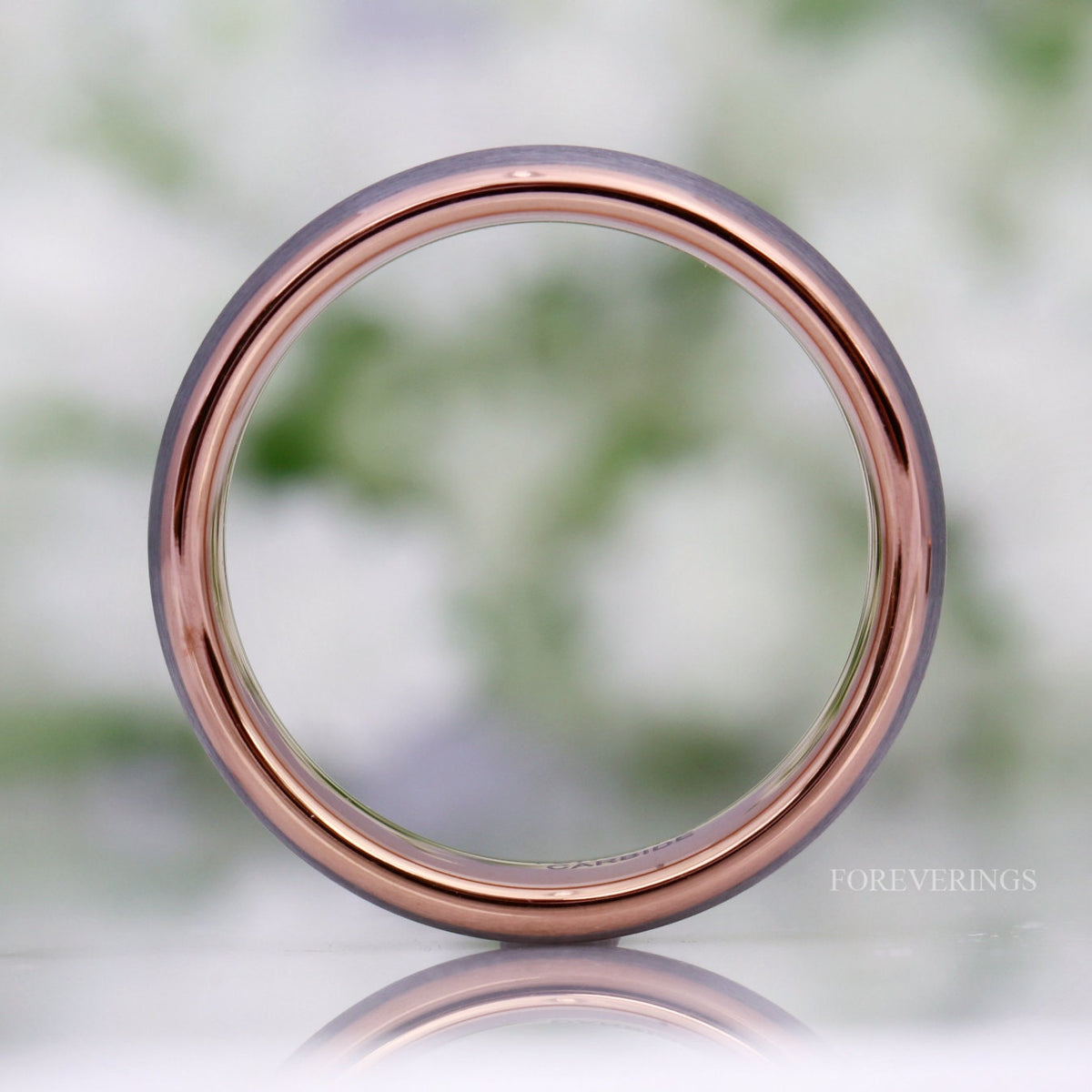6mm silver tungsten band viewed straight on through the center, showing the rose gold lining