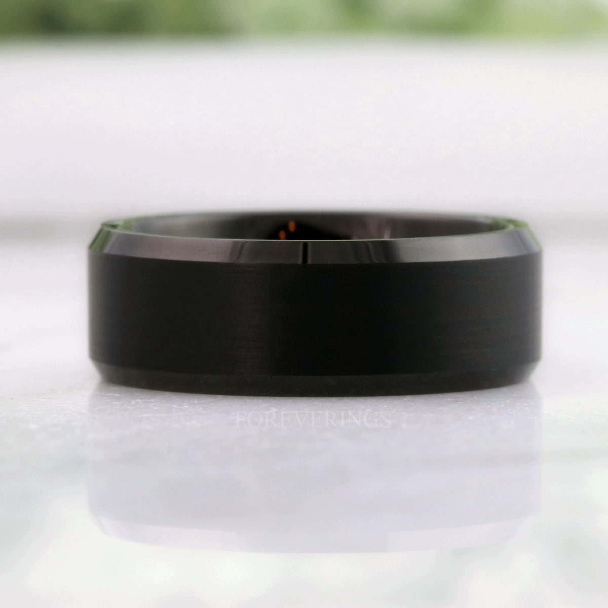 Men's 8mm flat black tungsten band with a brushed finish, shown straight on