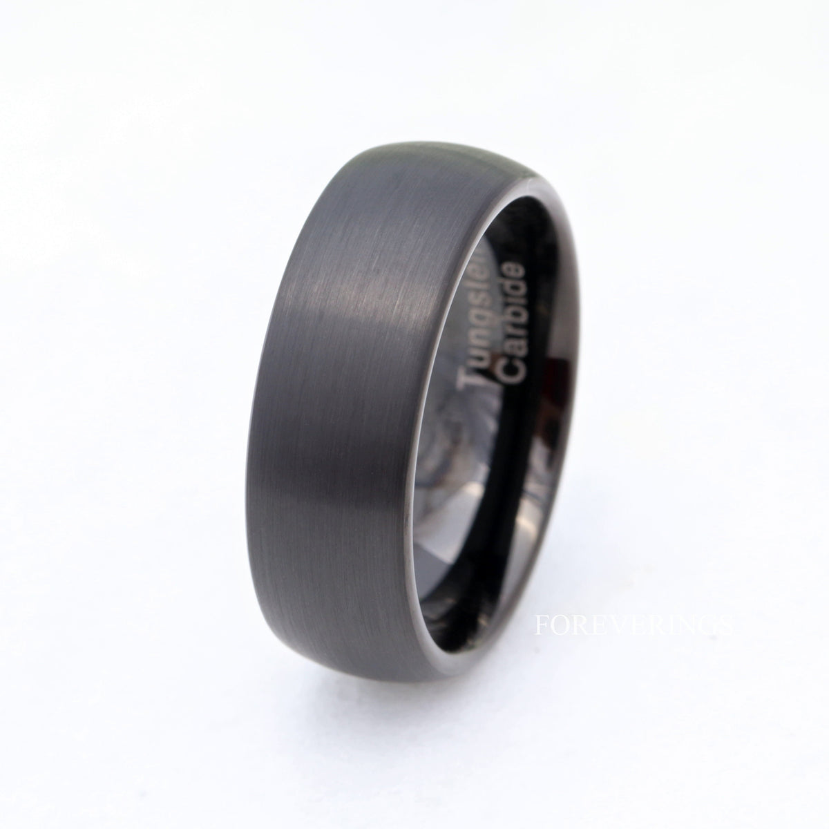 8mm matte black tungsten band angled on white to show the polished black interior