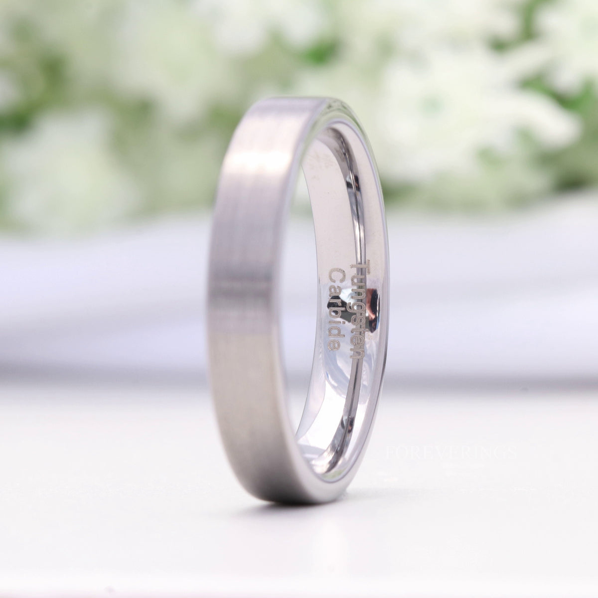 4mm flat silver tungsten ring angled to show the polished interior