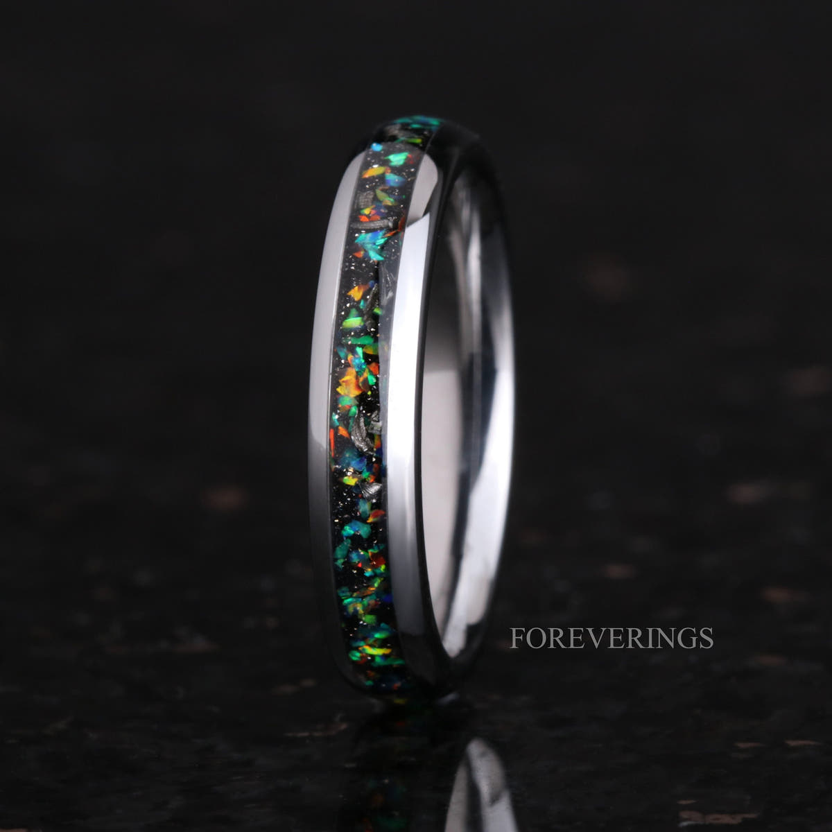 Women's 4mm silver tungsten ring with meteorite and galaxy opal inlay, standing upright