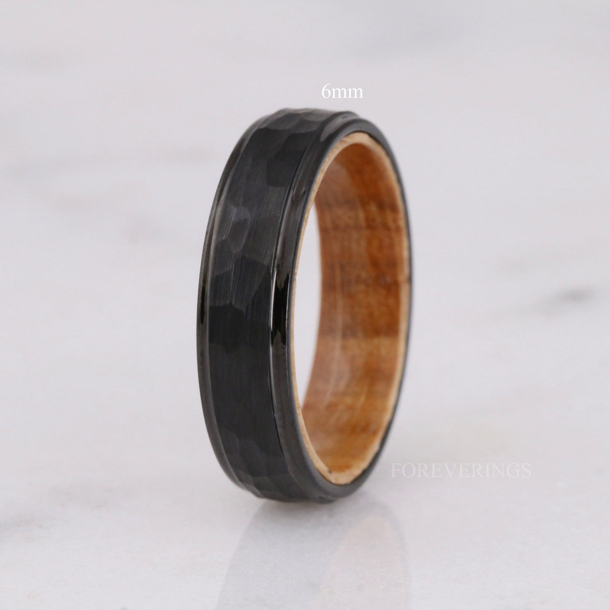 6mm width option: hammered black tungsten band with whiskey barrel wood interior