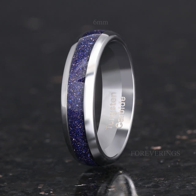 Men's 6mm silver tungsten band with blue sandstone inlay, angled to show the interior
