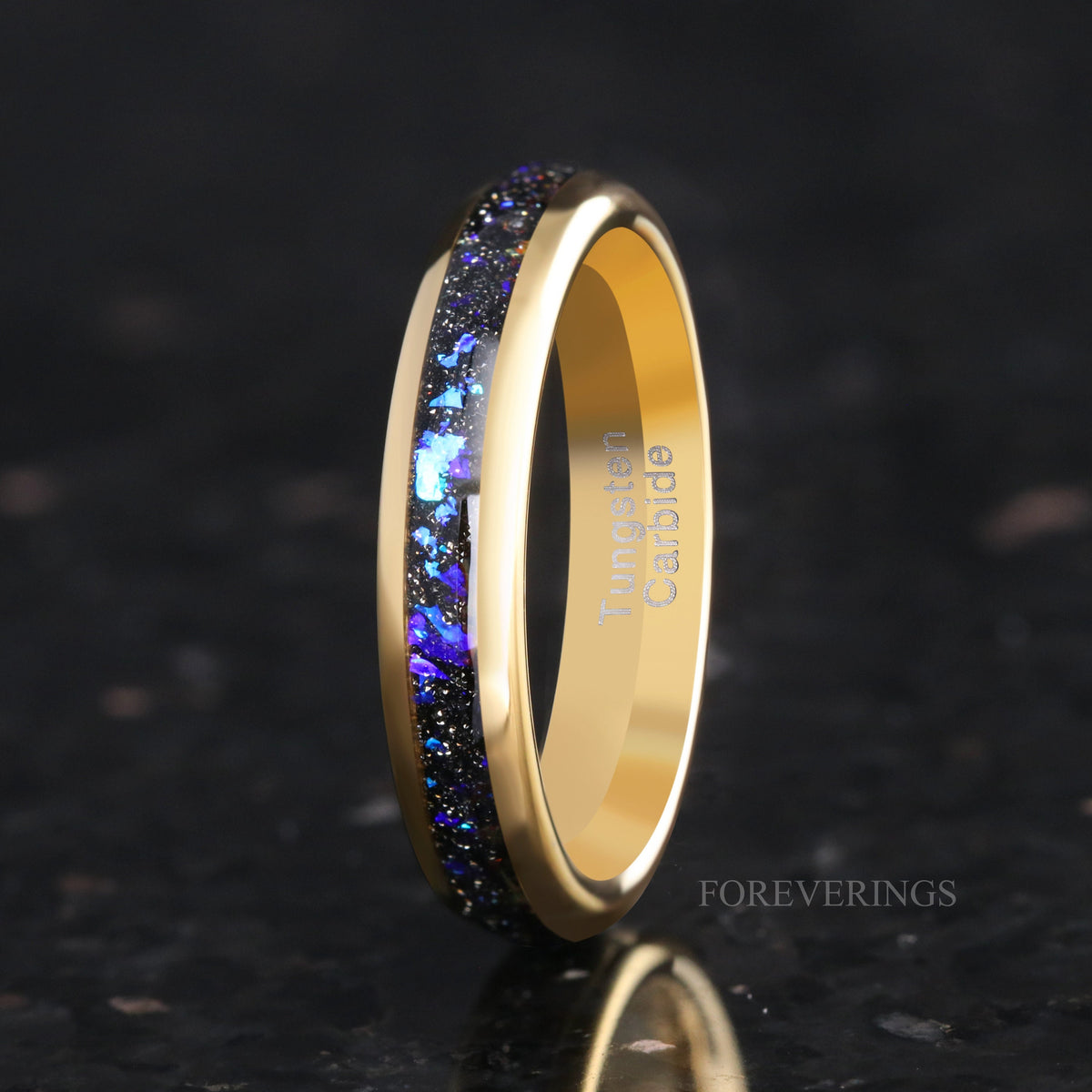 Women's 4mm gold tungsten ring with nebula sandstone inlay, angled to show the interior