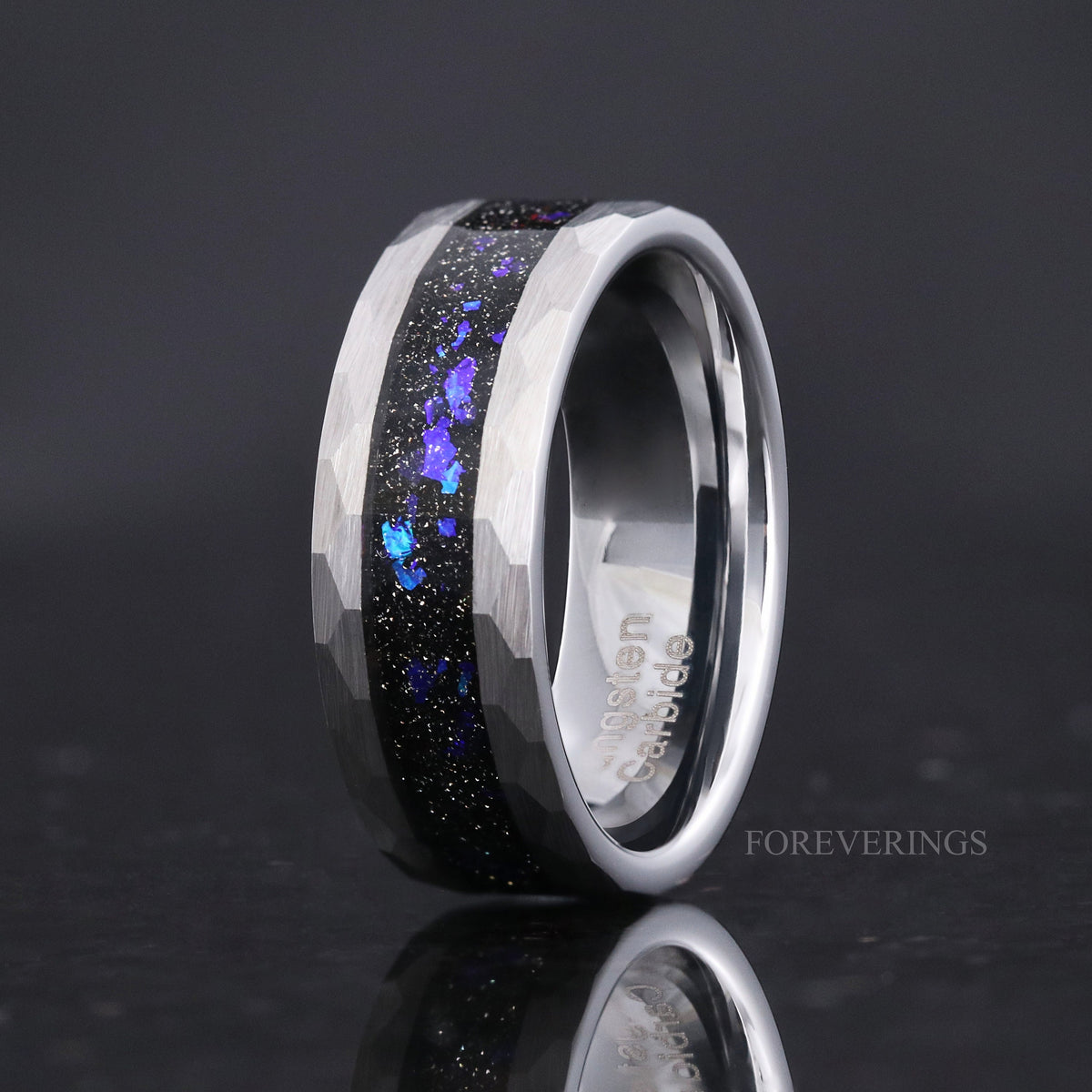 Men's 8mm hammered silver tungsten band with nebula sandstone inlay, angled to show the interior