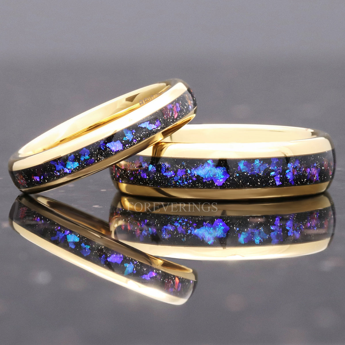 Narrow and wide gold tungsten nebula bands, one leaning on the other, wider view