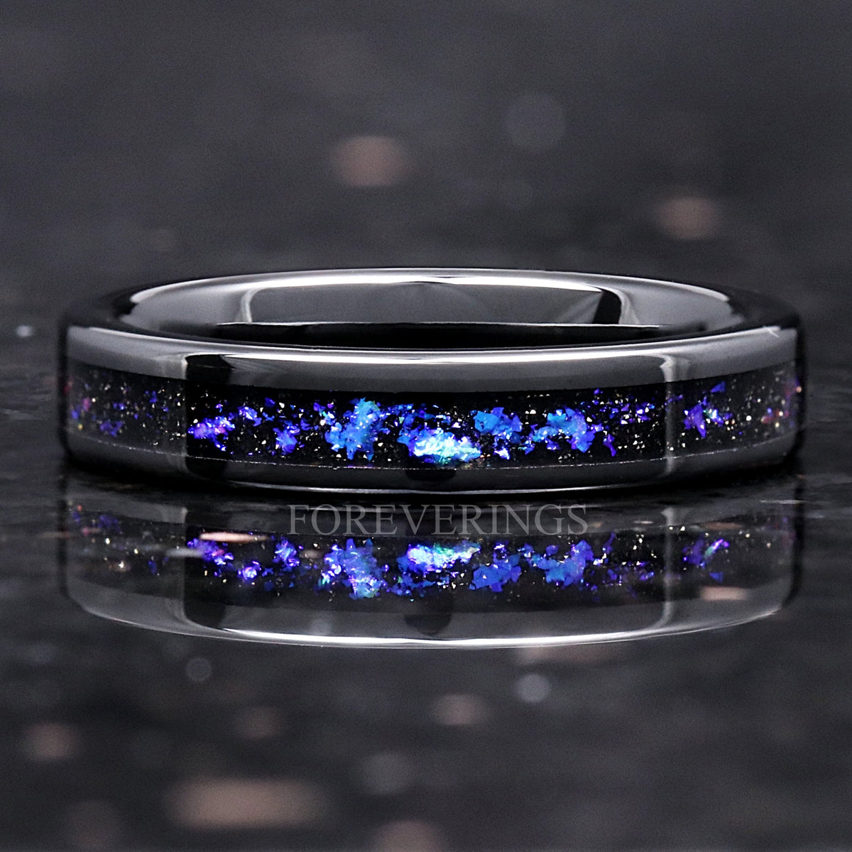4mm black ceramic wedding band with an Orion nebula sandstone inlay, straight on