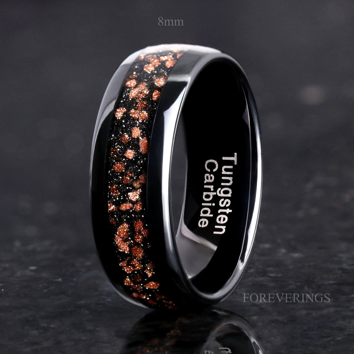 8mm black tungsten ring with red goldstone inlay standing upright, labeled 8mm