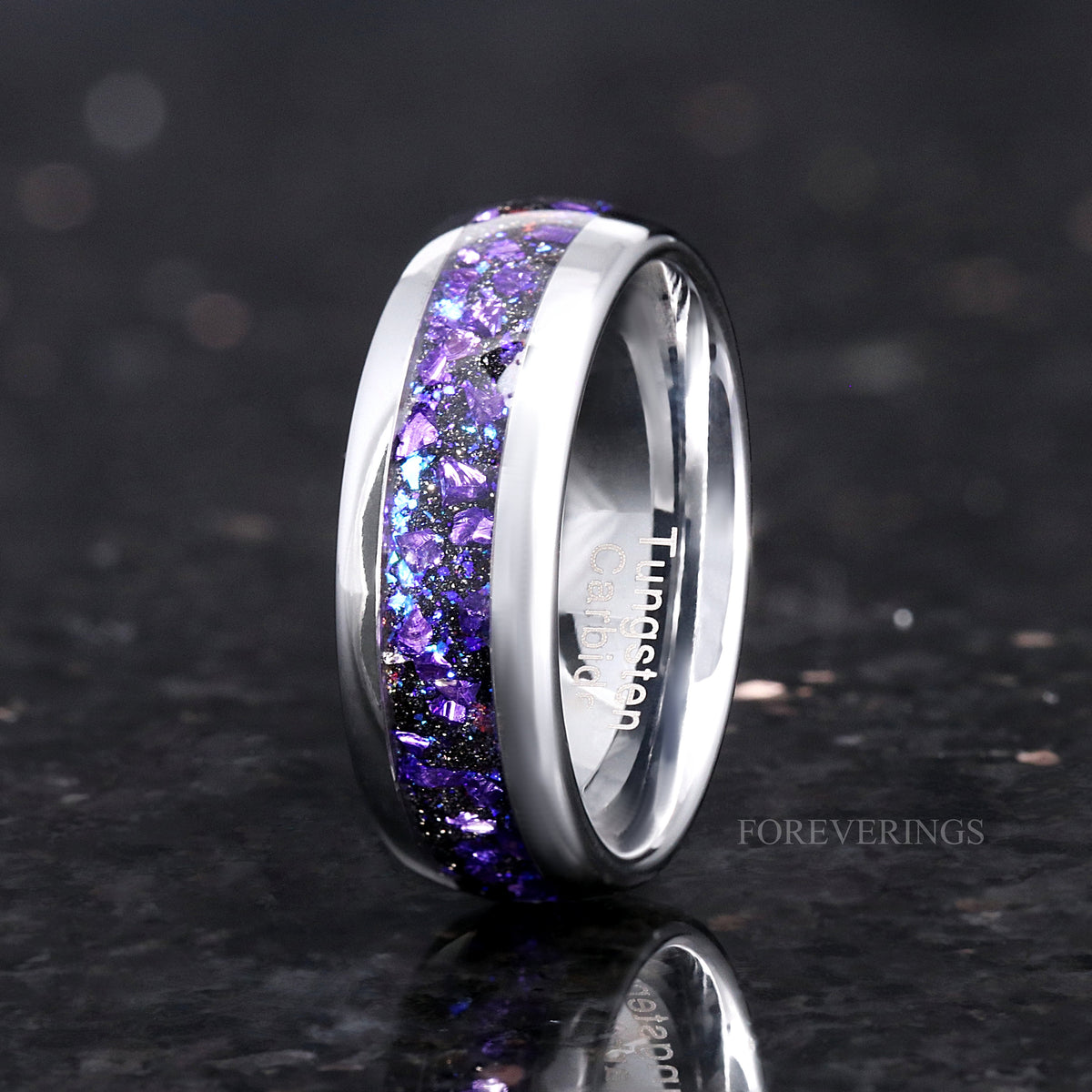 Men's 8mm silver tungsten band with alexandrite and purple sandstone inlay, angled to show the interior
