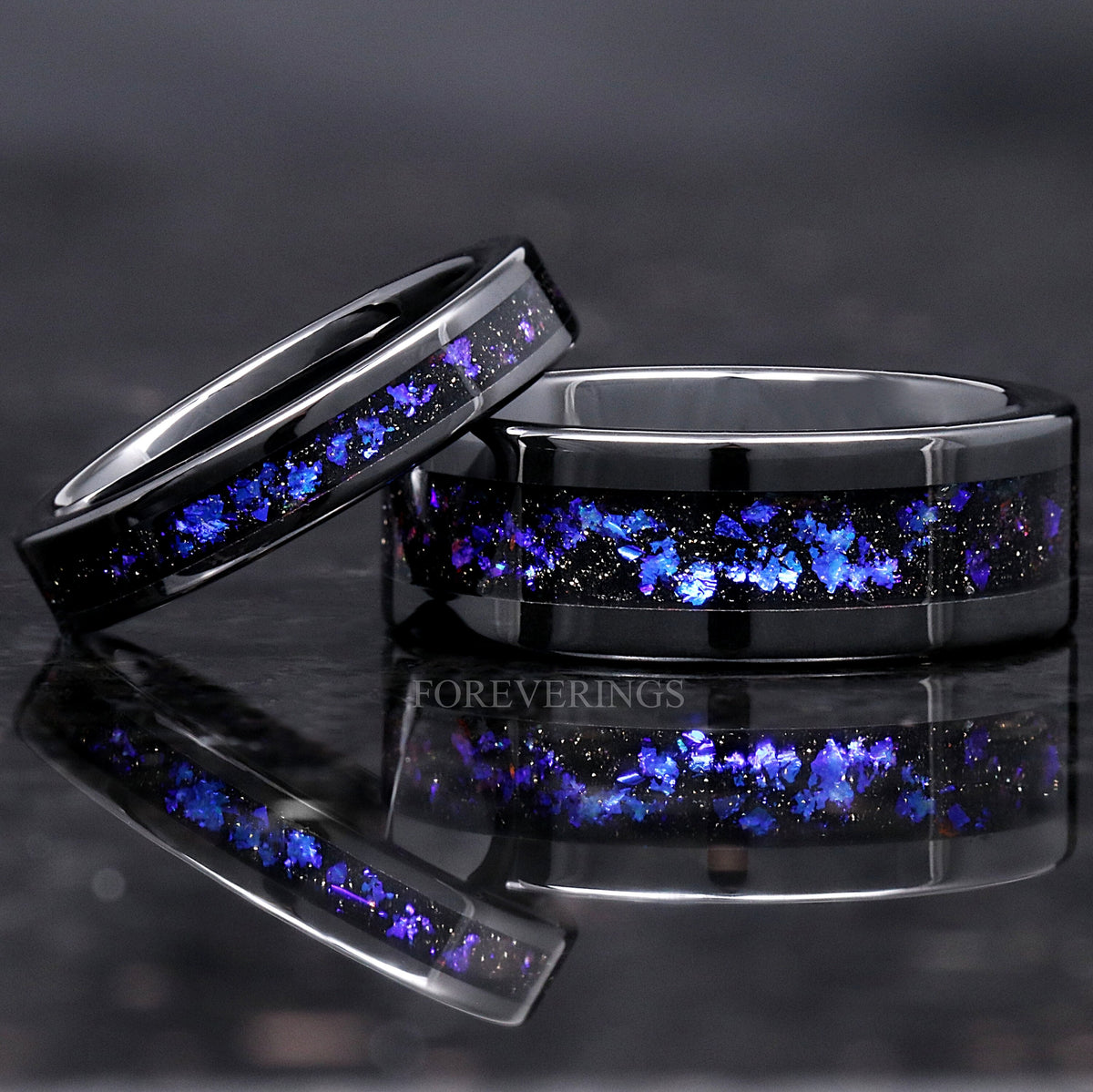 4mm black ceramic nebula band leaning on a wider nebula band