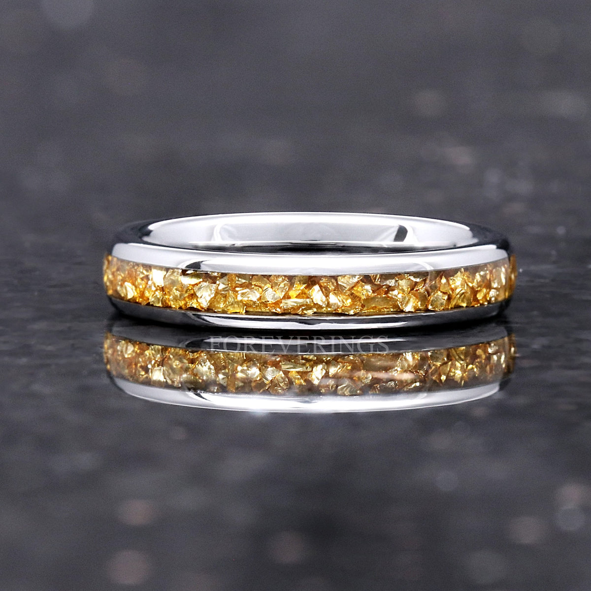 4mm silver tungsten band with citrine inlay lying flat, side view