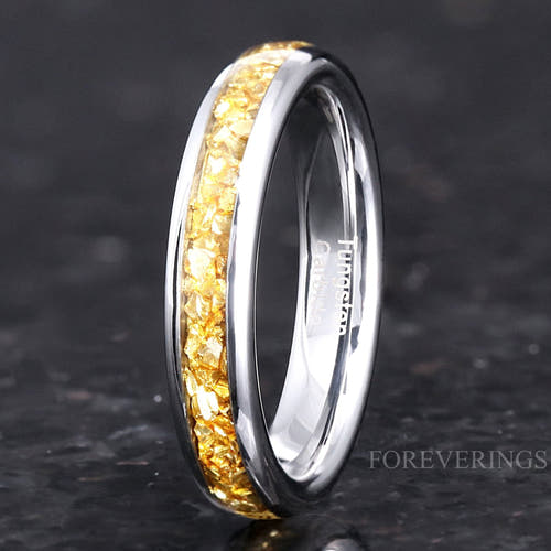 4mm silver tungsten wedding band with crushed citrine inlay standing upright, polished dome