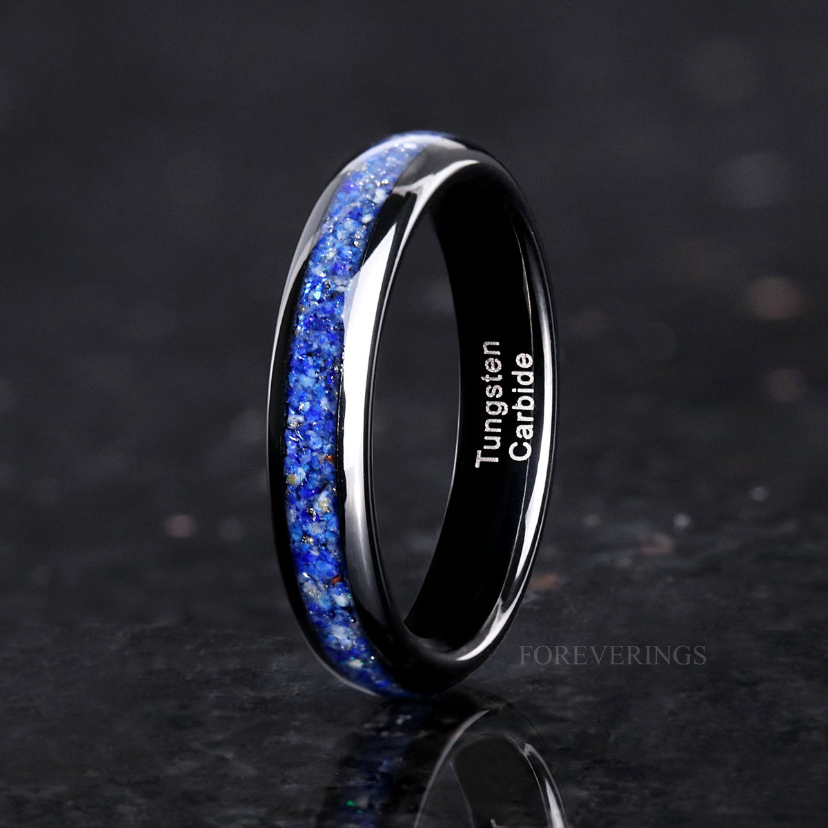 4mm black tungsten lapis lazuli ring standing on edge in a wider side view