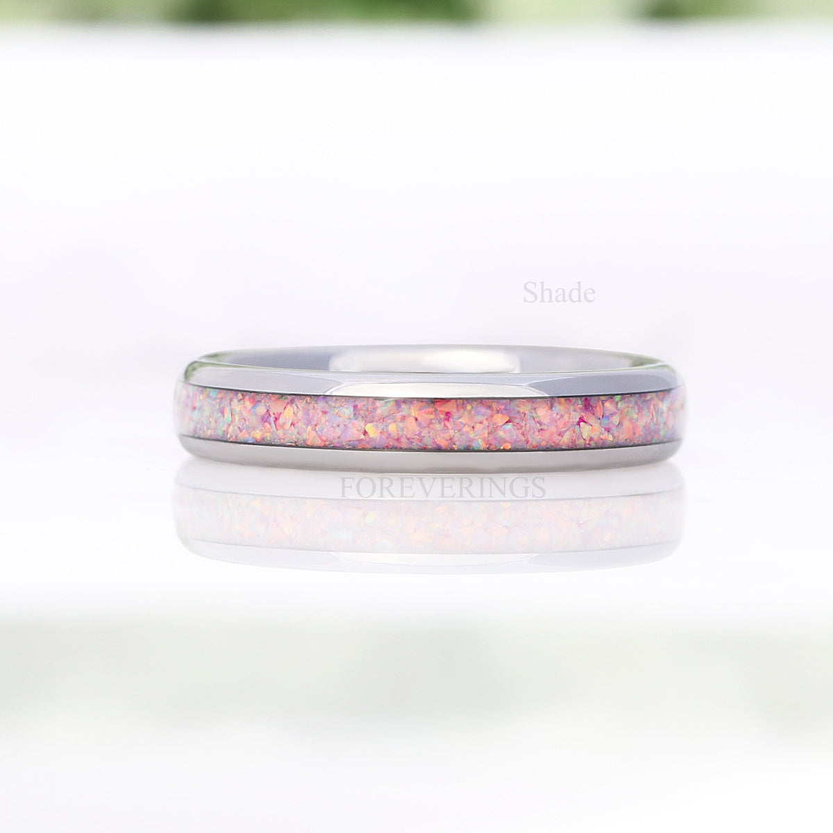 Unicorn fire opal tungsten ring in shade, wider straight-on view