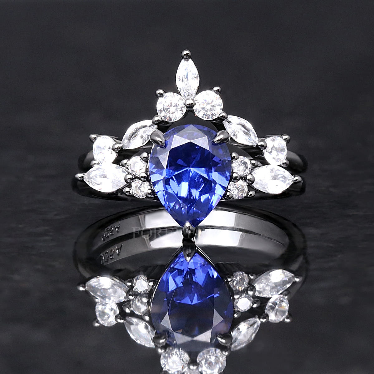 Women's pear blue sapphire ring in black sterling silver, shown straight on