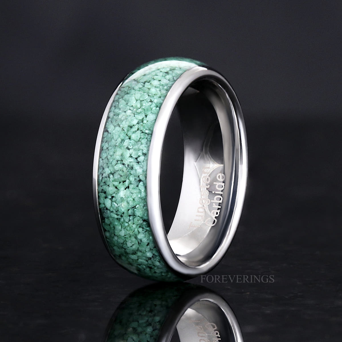 Men's 8mm silver tungsten ring with natural green moss agate inlay, standing upright