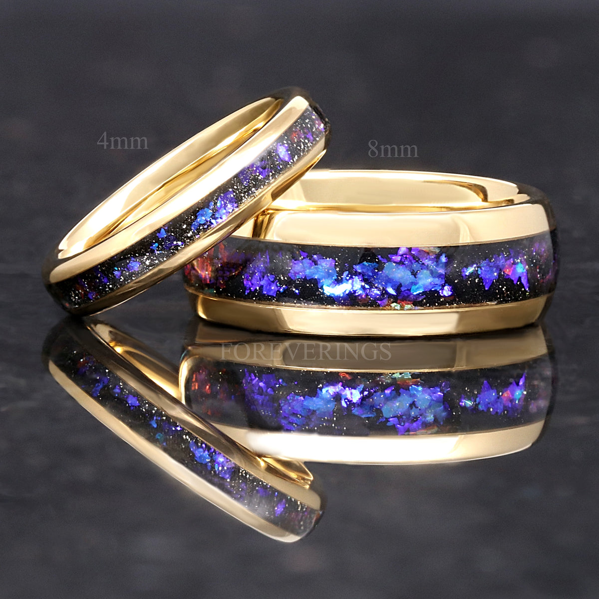 4mm and 8mm gold tungsten bands with nebula sandstone inlay, the 4mm leaning on the 8mm