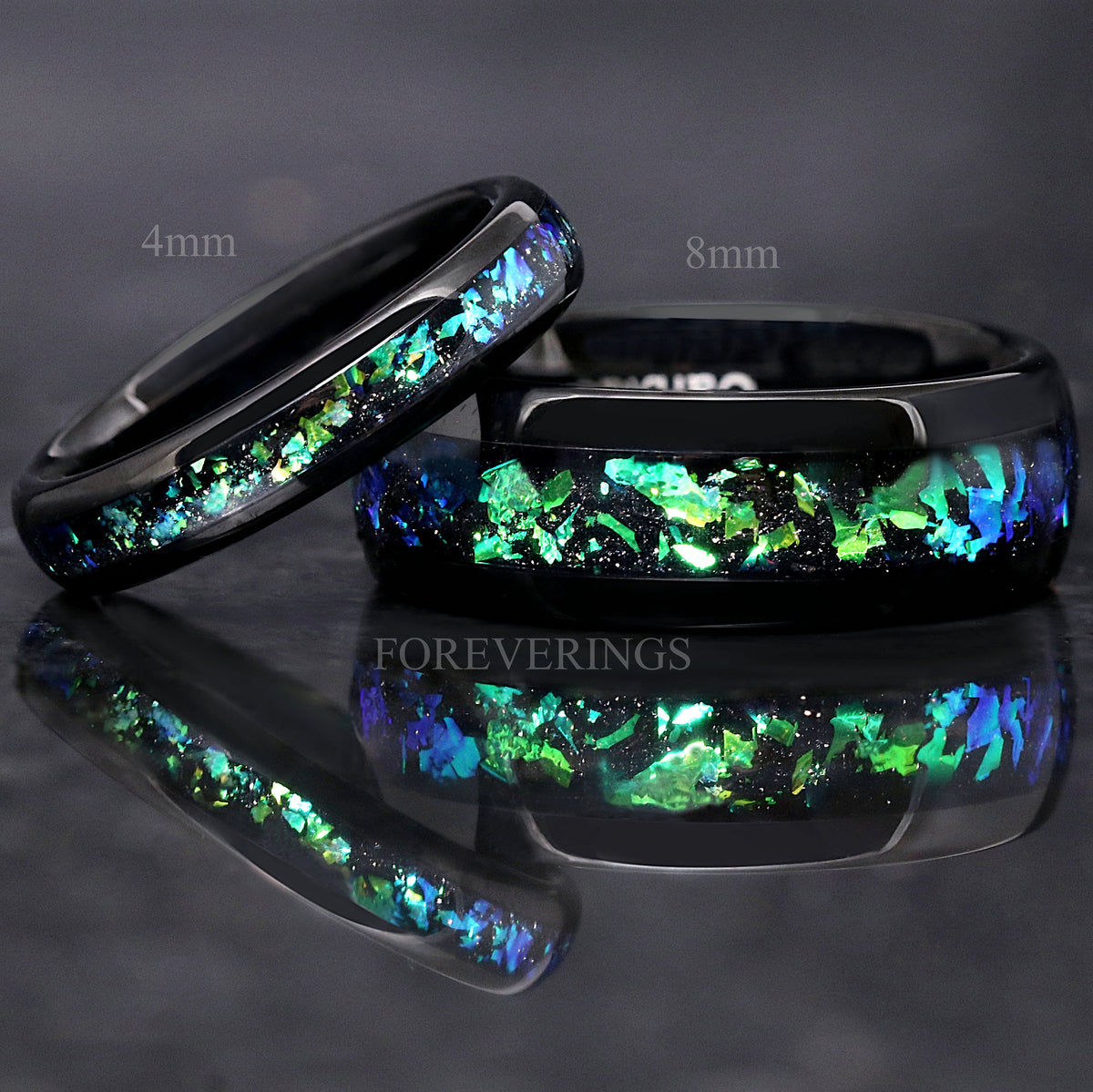 4mm black tungsten nebula ring leaning on the 8mm band, both labeled with their widths