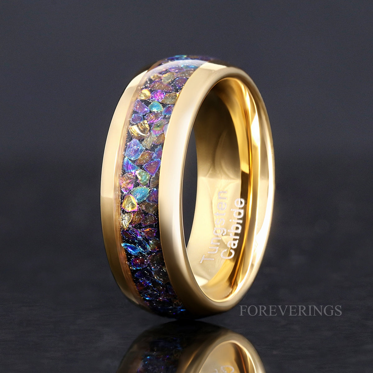 His 8mm gold tungsten ring with moonstone inlay, angled to show the polished interior